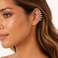 Model wearing silver pearl crystal ear cuff