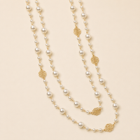 Long pearl necklace with gold rose charms product-only view